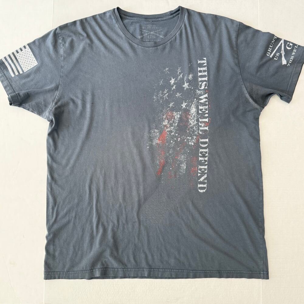 Grunt Style XXL Gray This We’ll Defend Distressed Flag Patriotic Tee